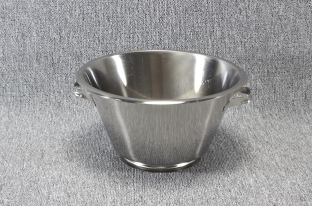 Eight shirts arranged on table in black, olive, grey, blue, white, red, mustard, and green.