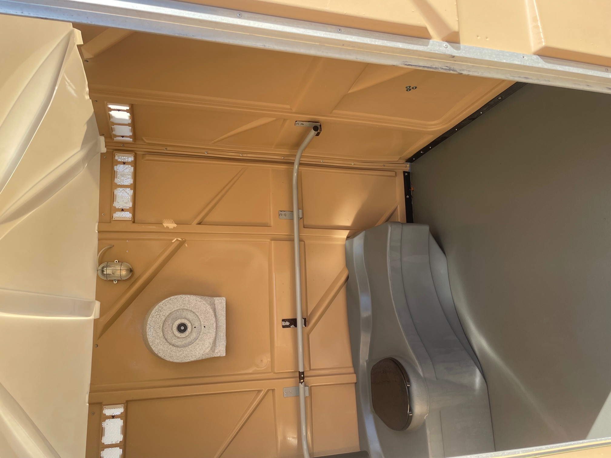 Eight shirts arranged on table in black, olive, grey, blue, white, red, mustard, and green.