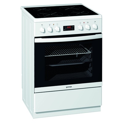 Eight shirts arranged on table in black, olive, grey, blue, white, red, mustard, and green.