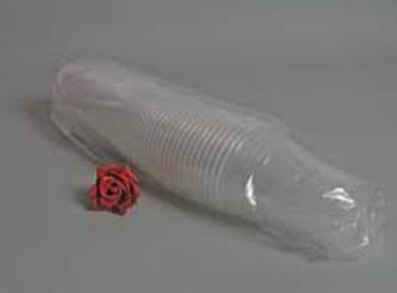 Eight shirts arranged on table in black, olive, grey, blue, white, red, mustard, and green.