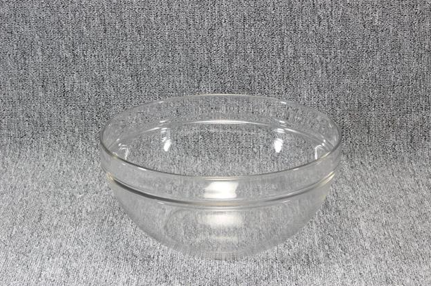 Eight shirts arranged on table in black, olive, grey, blue, white, red, mustard, and green.