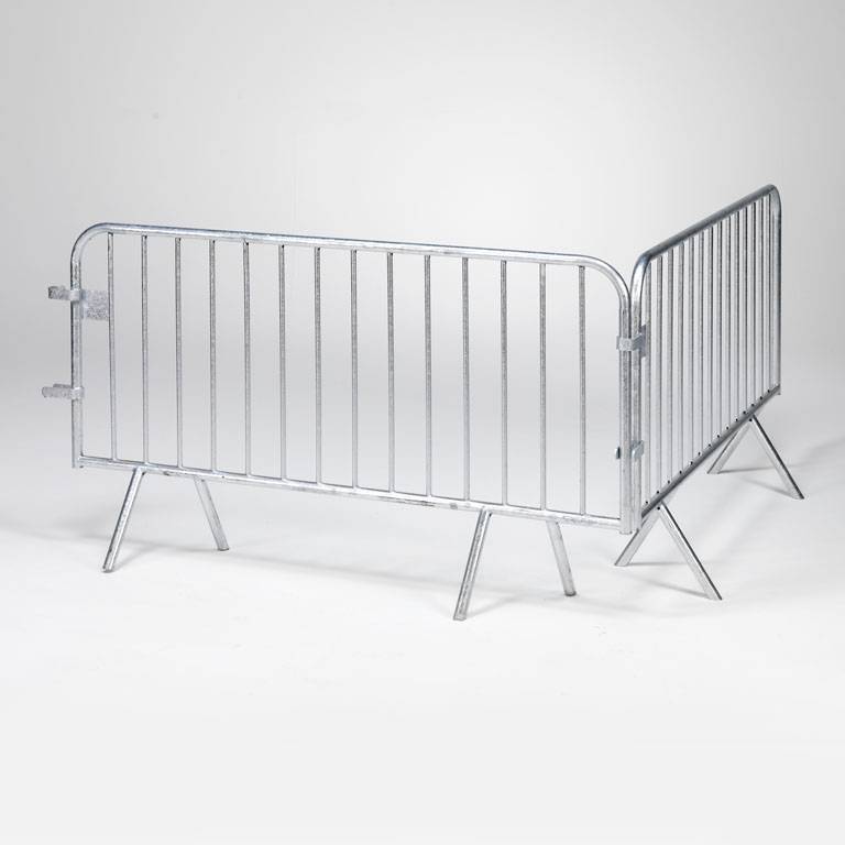 Eight shirts arranged on table in black, olive, grey, blue, white, red, mustard, and green.