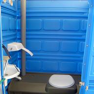 Eight shirts arranged on table in black, olive, grey, blue, white, red, mustard, and green.