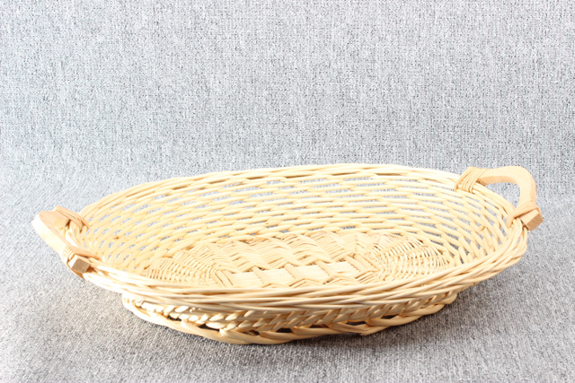 Eight shirts arranged on table in black, olive, grey, blue, white, red, mustard, and green.