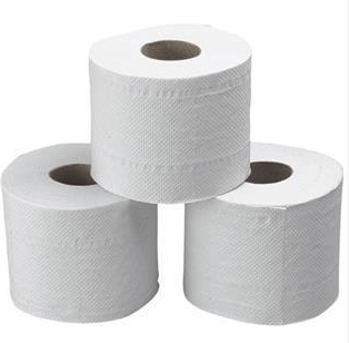 Eight shirts arranged on table in black, olive, grey, blue, white, red, mustard, and green.