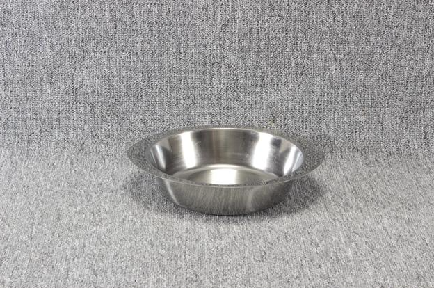 Eight shirts arranged on table in black, olive, grey, blue, white, red, mustard, and green.