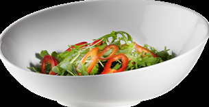 Eight shirts arranged on table in black, olive, grey, blue, white, red, mustard, and green.