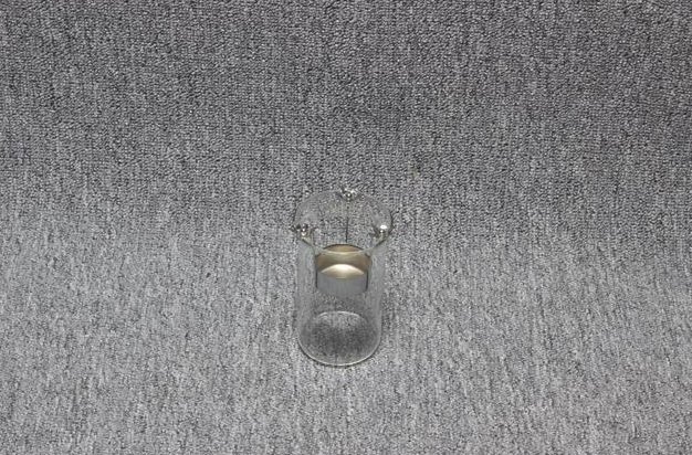 Eight shirts arranged on table in black, olive, grey, blue, white, red, mustard, and green.